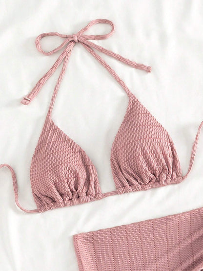 Bikini de 3 piezas rosa con top halter y pareo tejido texturizado