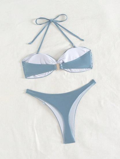 Bikini Azul Satinado Con Flor Decorativa Y Corte Tanga